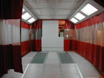 Zona de preparación HURACÁN sobre elevada con plénum y cerramiento lateral mediante cortinas manuales.